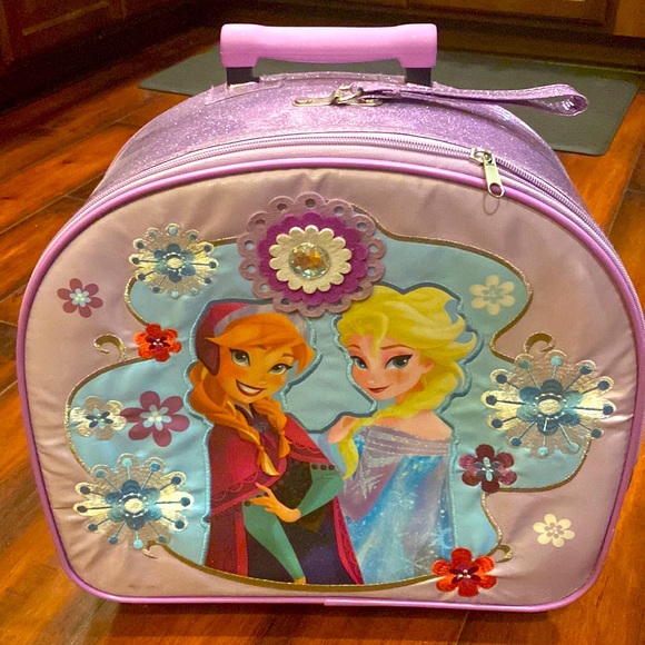 SOLD. NOT FOR SALE. frozen kids luggage purchased at Disney store